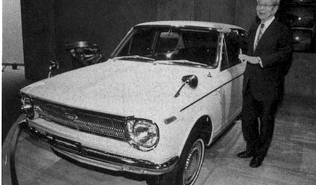 Tatsuo Hasegawa with an early Toyota passenger car